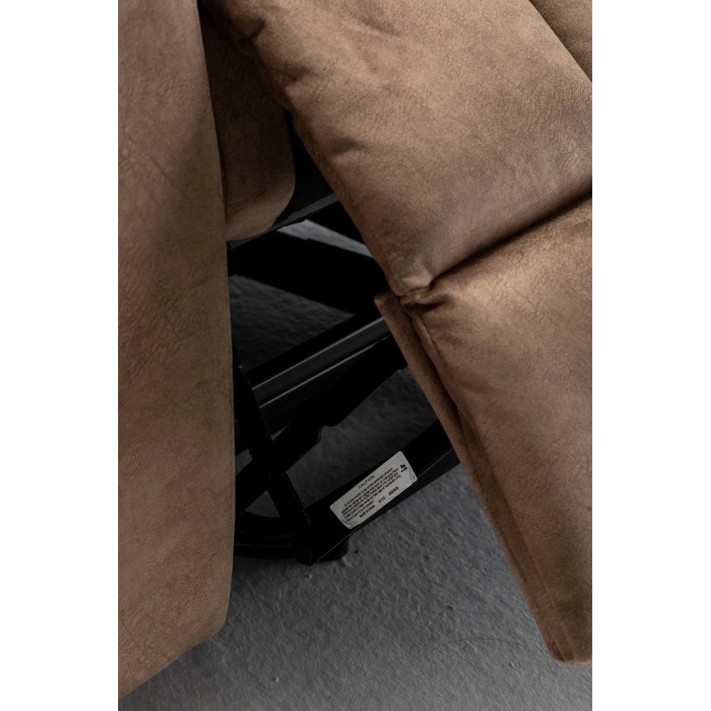 Close-up of brown upholstered recliner chair footrest and metal frame on carpeted floor
